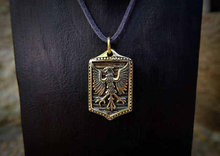 Eagle Crest Brass Pendant